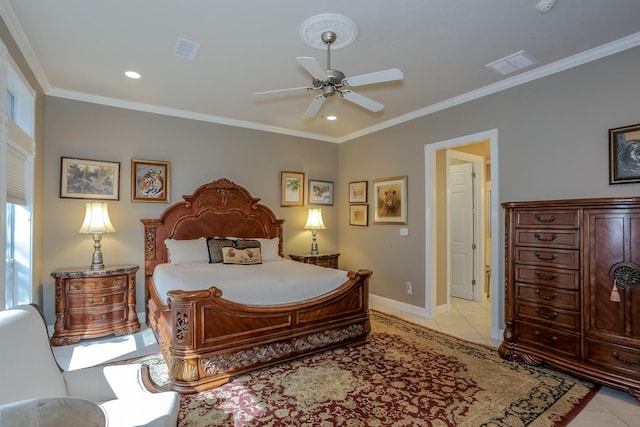 bedroom featuring light tile patterned floors, baseboards, visible vents, and ornamental molding