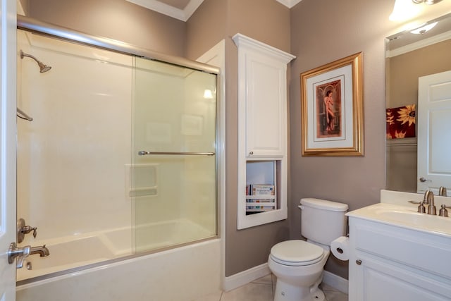 full bathroom featuring baseboards, toilet, tile patterned flooring, combined bath / shower with glass door, and vanity