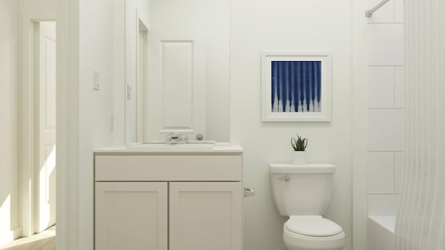 bathroom featuring toilet, bathing tub / shower combination, and vanity