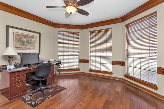 office featuring baseboards, ornamental molding, and wood finished floors