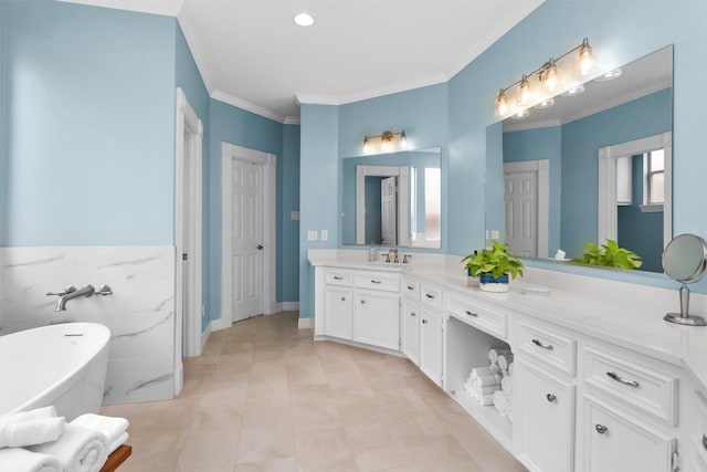 full bath featuring a soaking tub, tile patterned flooring, ornamental molding, and vanity