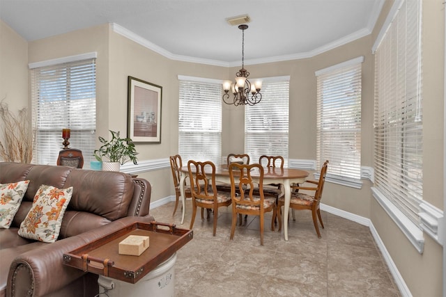 dining space with baseboards, ornamental molding, visible vents, and a notable chandelier