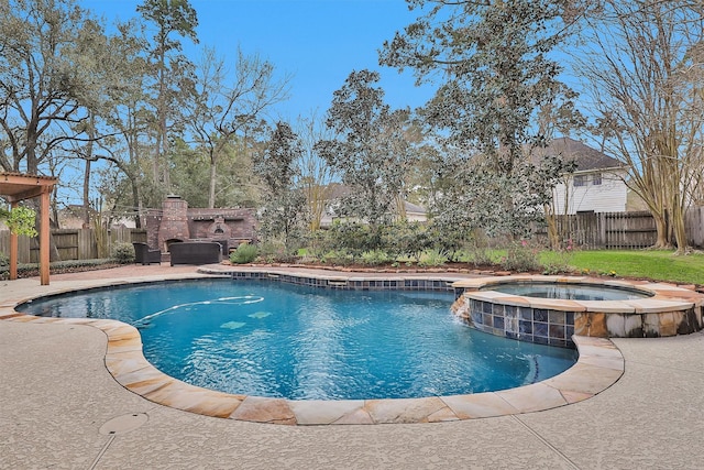 view of pool with a patio, exterior fireplace, a fenced backyard, and a pool with connected hot tub