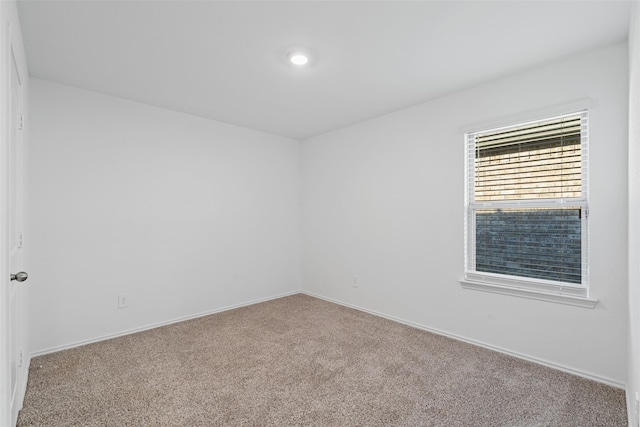 14428 Sugar Pines Dr, Conroe, TX 77302 - unfurnished room featuring baseboards and carpet flooring