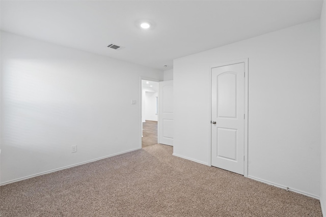 14428 Sugar Pines Dr, Conroe, TX 77302 - unfurnished bedroom featuring baseboards, light colored carpet, recessed lighting, and visible vents