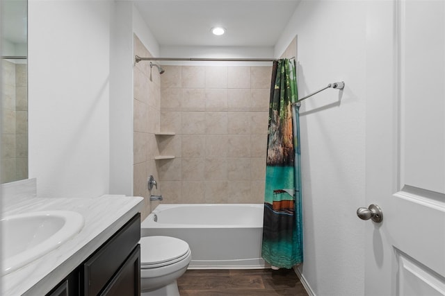 14428 Sugar Pines Dr, Conroe, TX 77302 - bathroom featuring wood finished floors, vanity, toilet, shower / bath combo with shower curtain, and recessed lighting