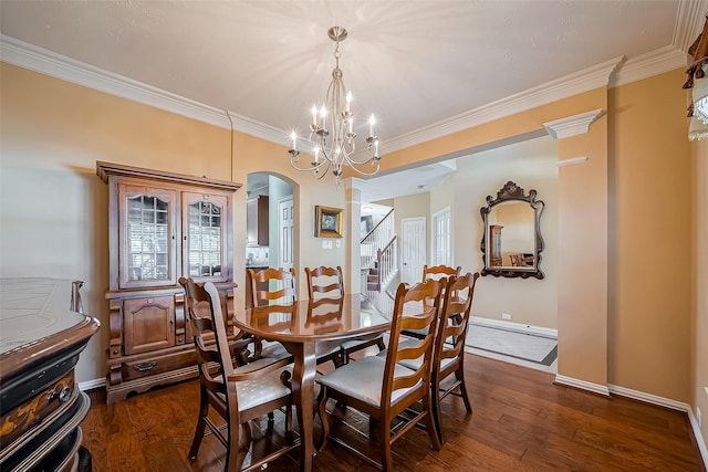 dining area featuring dark wood-style floors, baseboards, arched walkways, and crown molding