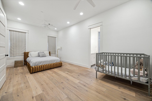 bedroom with light wood-style flooring, baseboards, a ceiling fan, and recessed lighting