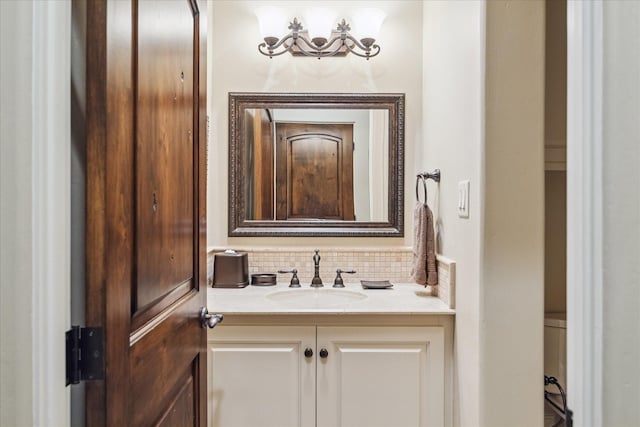 bathroom with backsplash and vanity