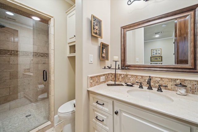 full bath with vanity, visible vents, decorative backsplash, a shower stall, and toilet