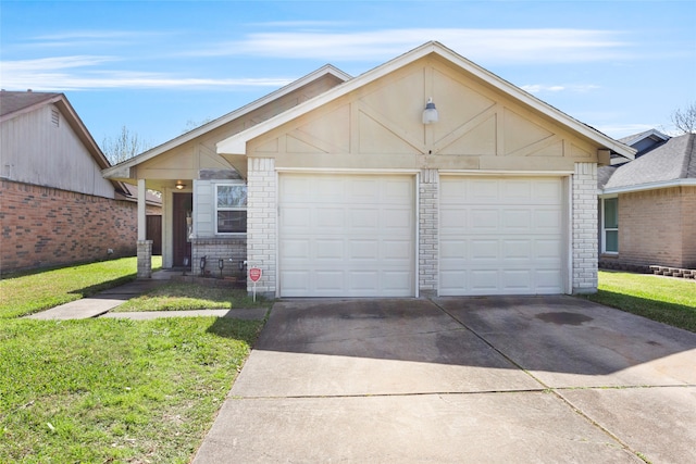 view of front of house with driveway, a front lawn, and brick siding