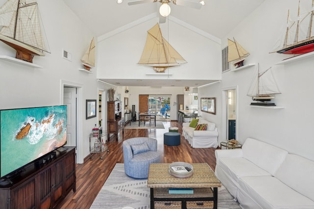 living room with high vaulted ceiling, wood finished floors, visible vents, and a ceiling fan