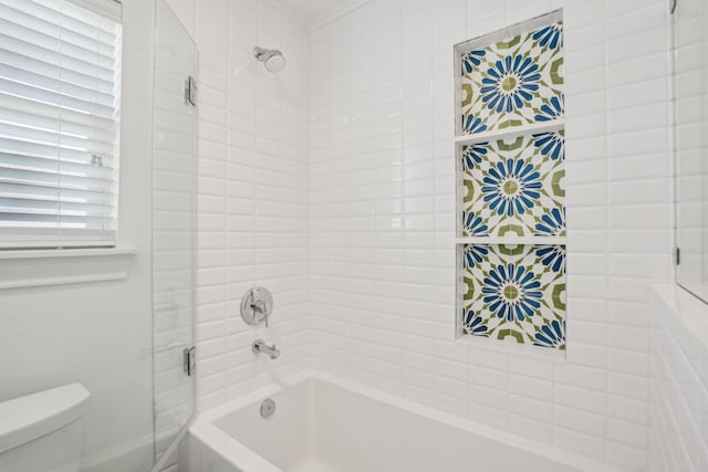 bathroom with shower / washtub combination and toilet