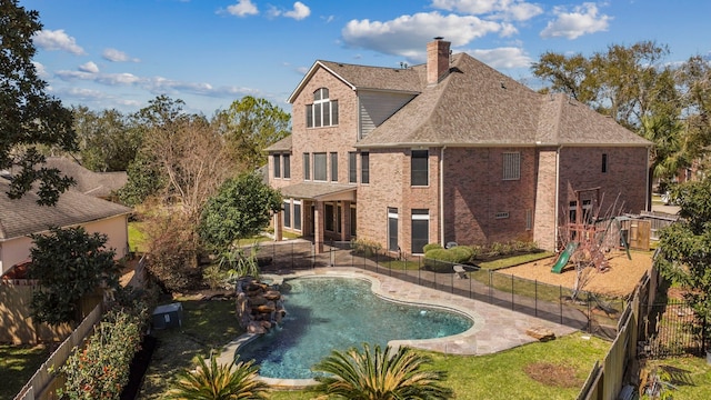 view of pool featuring a fenced in pool, a fenced backyard, and a patio area