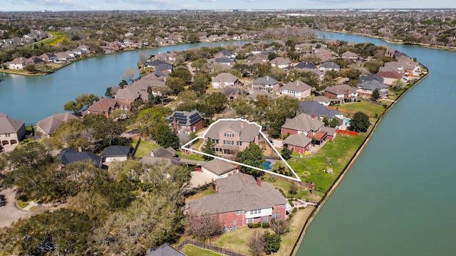 aerial view featuring a residential view and a water view