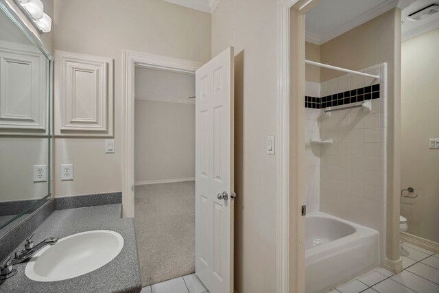 bathroom with tile patterned floors, toilet, and ornamental molding