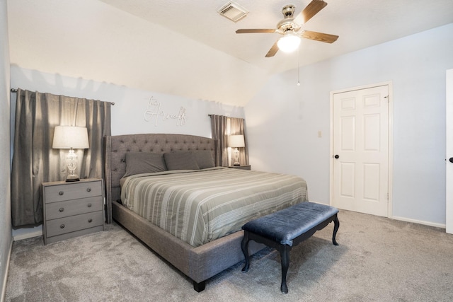 bedroom with visible vents, baseboards, lofted ceiling, ceiling fan, and carpet