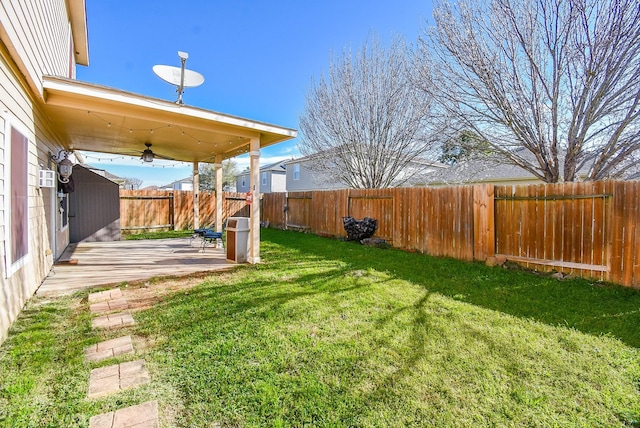 view of yard featuring a patio area and a fenced backyard