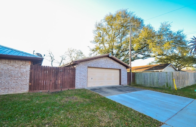 detached garage featuring fence