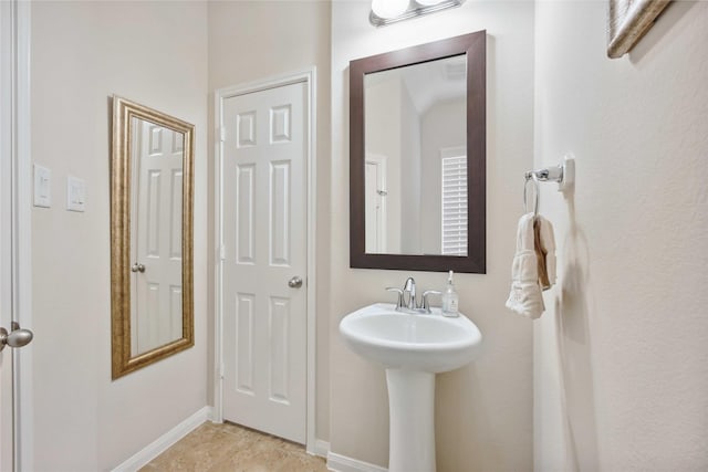 bathroom with baseboards