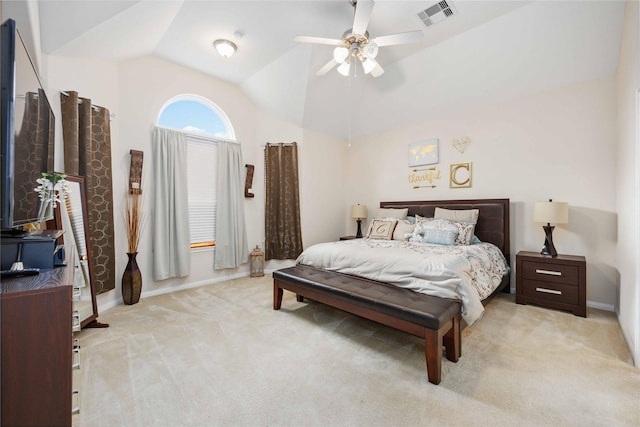 bedroom featuring light carpet, baseboards, visible vents, a ceiling fan, and vaulted ceiling