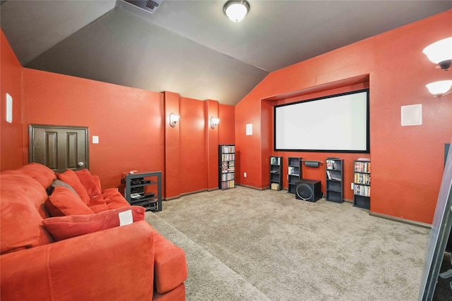 carpeted cinema featuring lofted ceiling