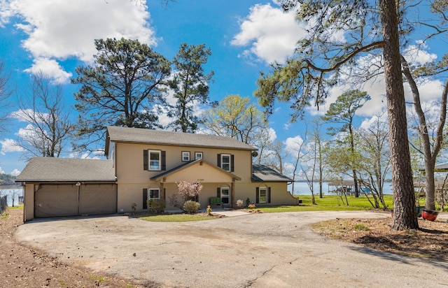 view of front of property with an attached garage and driveway