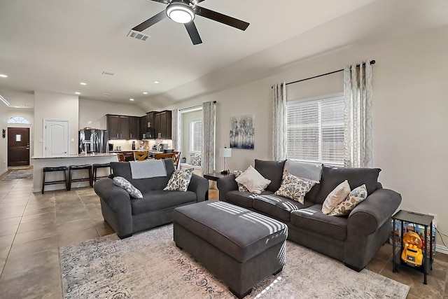 living room with recessed lighting, visible vents, a ceiling fan, and light tile patterned flooring