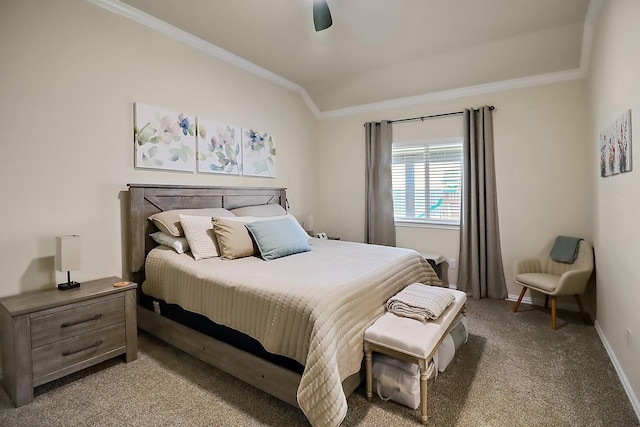 carpeted bedroom featuring ceiling fan, baseboards, and crown molding