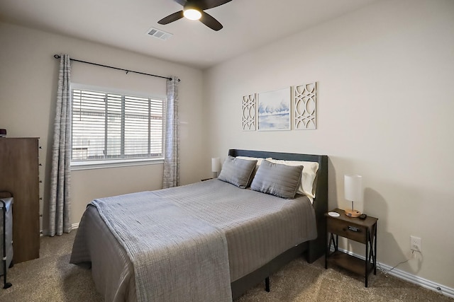 bedroom with a ceiling fan, carpet, visible vents, and baseboards