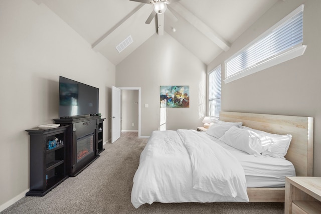 bedroom with carpet, beam ceiling, visible vents, and baseboards