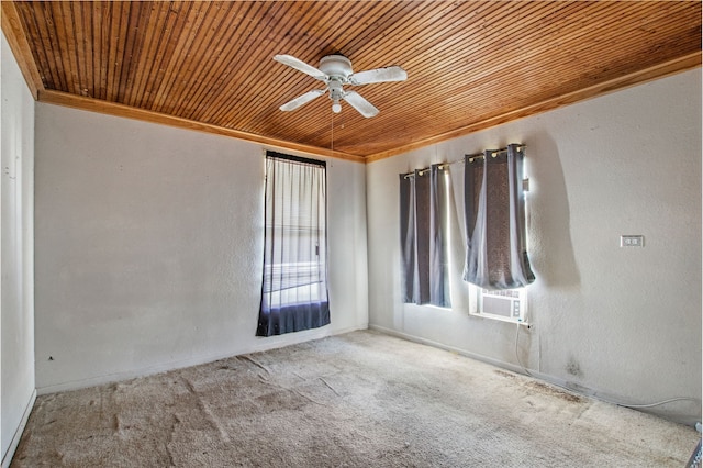 spare room featuring carpet, wood ceiling, ornamental molding, and a textured wall