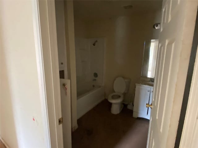 full bath featuring tub / shower combination, vanity, and toilet