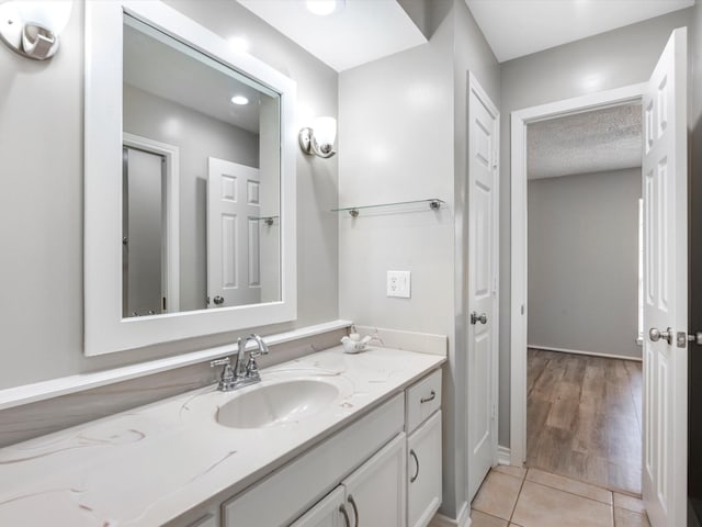 bathroom featuring vanity and tile patterned flooring