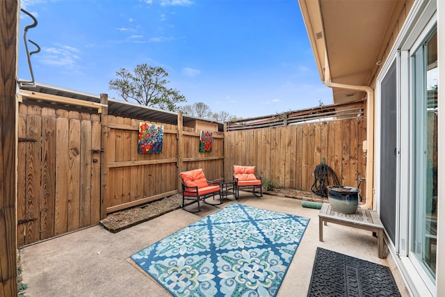 view of patio / terrace with fence