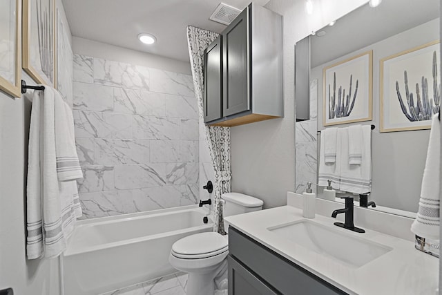 full bathroom featuring visible vents, toilet, marble finish floor, bathtub / shower combination, and vanity