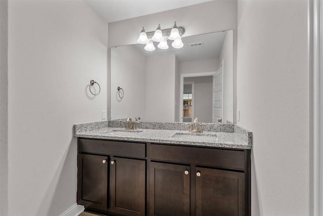 13324 Silver Egret Ln, Texas City, TX 77568 - full bathroom featuring double vanity, a sink, and visible vents