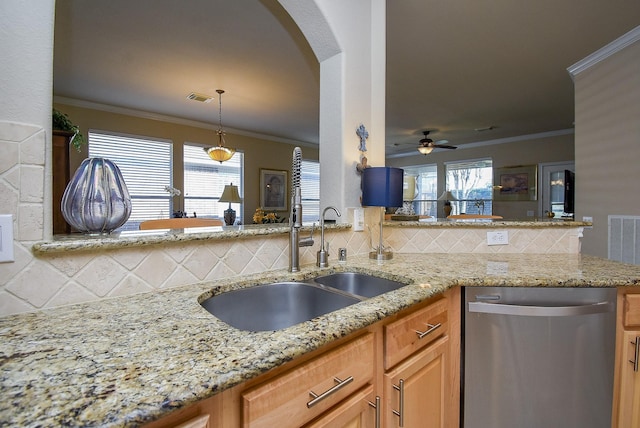 kitchen with crown molding, visible vents, arched walkways, and dishwasher