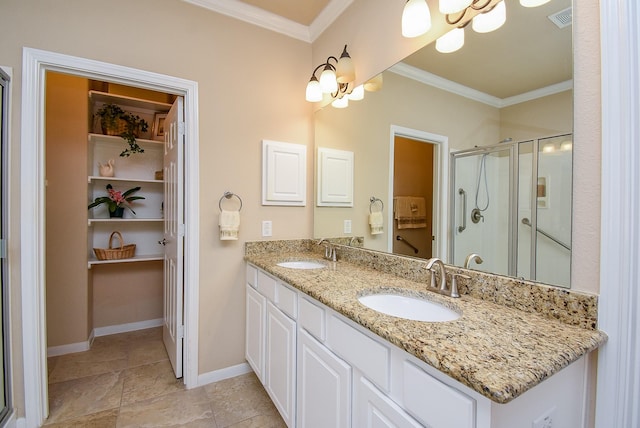 bathroom with a stall shower, visible vents, a chandelier, and a sink