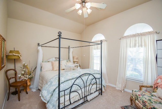 bedroom with carpet, vaulted ceiling, and baseboards