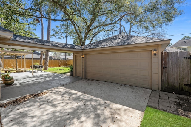 garage featuring fence