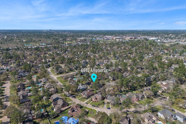 birds eye view of property with a residential view