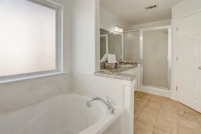 full bath featuring tile patterned flooring, visible vents, vanity, a bath, and a stall shower