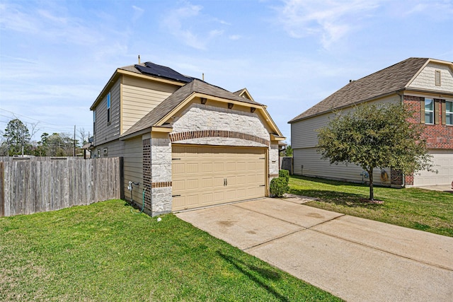 15307 Meandering Post Trl, Houston, TX 77044 - view of property exterior featuring stone siding, brick siding, and driveway