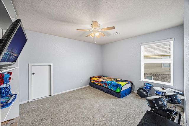 15307 Meandering Post Trl, Houston, TX 77044 - unfurnished bedroom with carpet floors, a textured ceiling, a ceiling fan, and baseboards