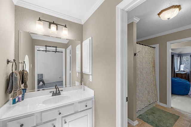 full bath with tile patterned flooring, crown molding, vanity, and curtained shower