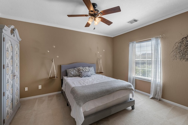 bedroom featuring light carpet, ornamental molding, visible vents, and baseboards