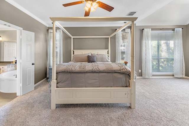 bedroom with baseboards, visible vents, carpet flooring, and ornamental molding