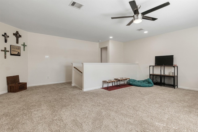 interior space with carpet floors, visible vents, and recessed lighting