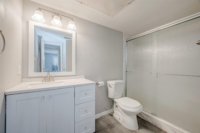 bathroom with visible vents, a textured wall, toilet, vanity, and a shower stall